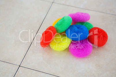 High angle view of colorful sponges on floor