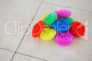High angle view of colorful sponges on floor