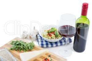 Close up of food and wine bottle
