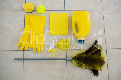 Overhead view of cleaning products and duster