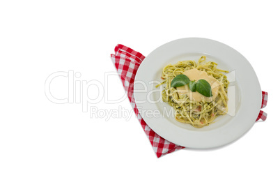 High angle view of pasta served with sauce in plate