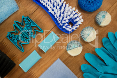 High angle view of cleaning products and brush