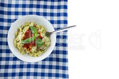 Close up of asta served in bowl on napkin