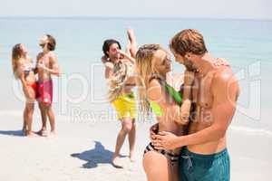 Romantic young couple at beach