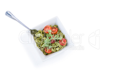 High angle view of pasta salad in bowl with fork