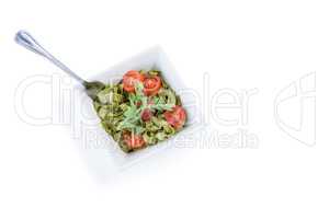 High angle view of pasta salad in bowl with fork