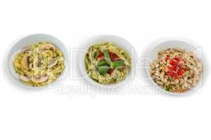 Overhead view of pastas served in containers