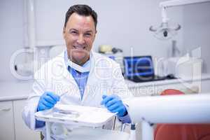 Portrait of smiling dentist