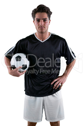 Football player holding a football