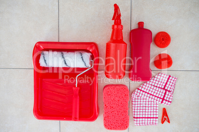 Overhead view of red cleaning products
