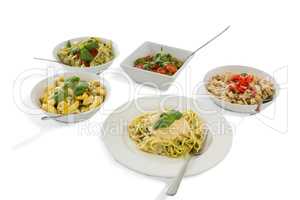 Close up of various pasta served in containers