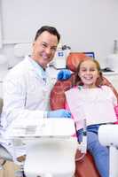 Dentist with young patient