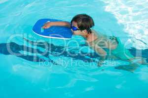 Boy swimming in the pool