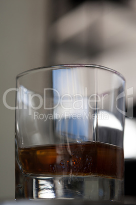 Close up of half filled alcohol glass