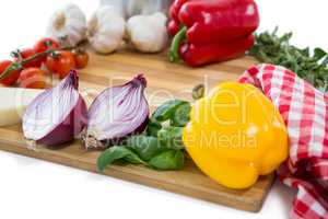Close up of various vegetables on cutting board