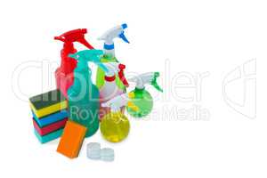 High angle view of colorful sponges and spray bottles