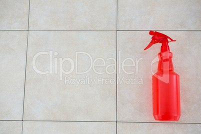 Overhead view of red spray bottle