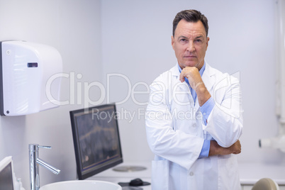 Portrait of confident dentist