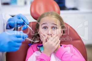 Young patient scared during a dental check-up