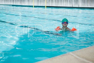 Boy swimming in the pool