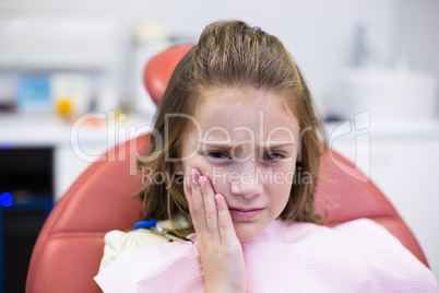 Unhappy young patient having a toothache