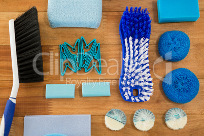 Overhead view of brushes and sponge with soaps