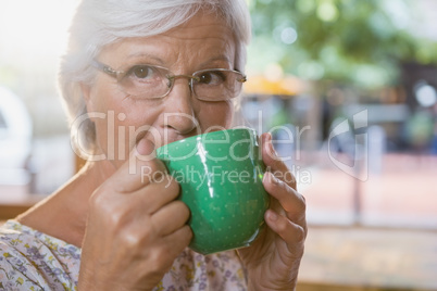 Senior woman drinking coffee