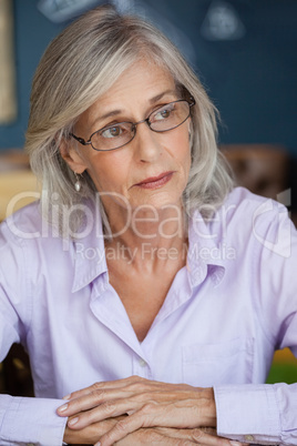Close up of worried senior woman looking away