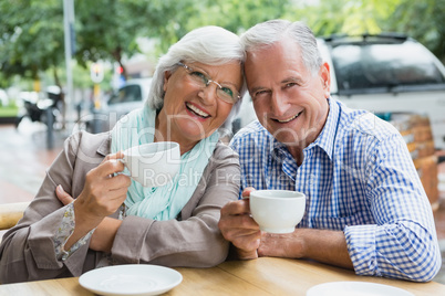 Portrait of senior couple having coffee