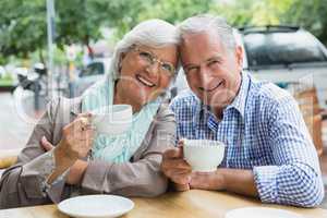 Portrait of senior couple having coffee