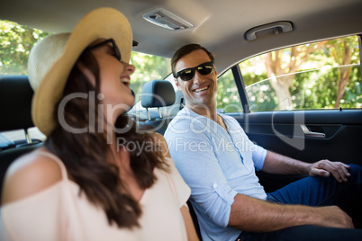 Couple traveling in car