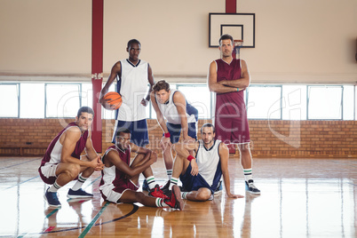 Confident basketball players in the court