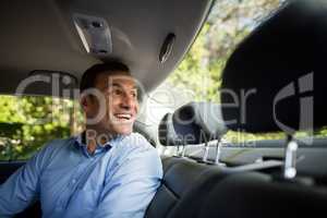 Man looking through windshield