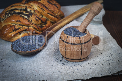 Poppy seeds in a wooden mortar