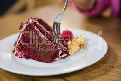 Close-up of woman having pastry