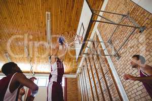 Player scoring a goal while playing basketball