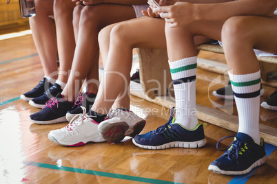 High school kids sitting on the bench