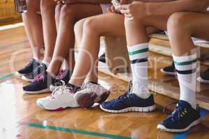 High school kids sitting on the bench