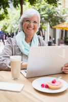 Senior woman using laptop