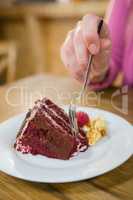 Close-up of woman having pastry