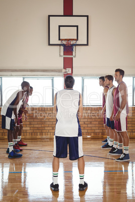 Basketball player about to take a penalty shot while playing basketball