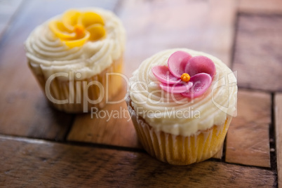 Close up of cupcakes on wooden table