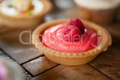 Close up of raspberry tart on table