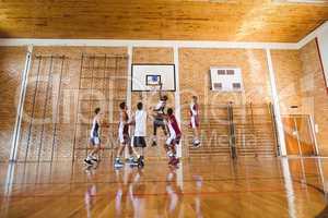 Player scoring a goal while playing basketball