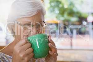 Senior woman drinking coffee