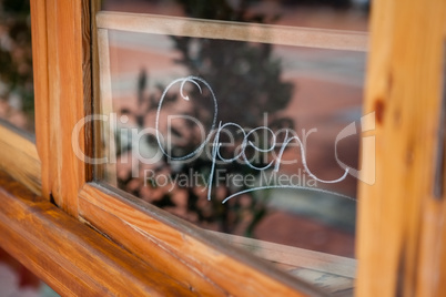 Close up of open text on glass window