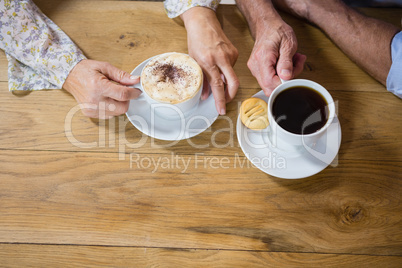 Senior couple having coffee