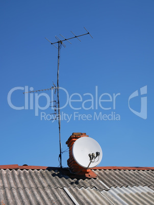 Antennas on the roof of an old house