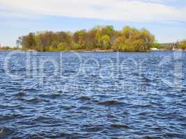 Waves on lake in fine spring weather
