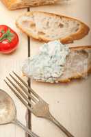 fresh blue cheese spread ove french baguette